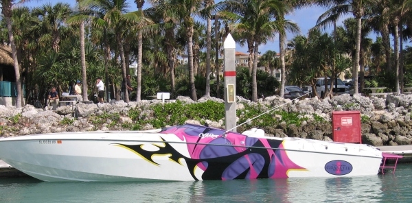 cafe-racing-boat-cigarette-at-dock